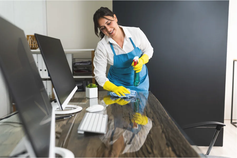 Professional cleaners maintaining a modern office space